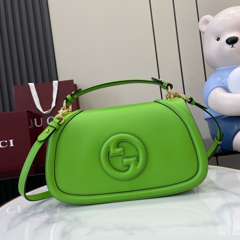 G*u*i top handle bags